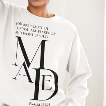 White sweatshirt with black text and design on a plain background