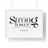 Strong Tower framed Christian wall art, Proverbs 18:10, black lettering on white with a white wooden frame