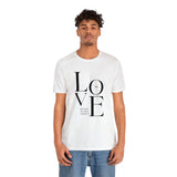Faith Culture - We Love Because He Loved Us First - Christian Unisex Jersey Short Sleeve Tee